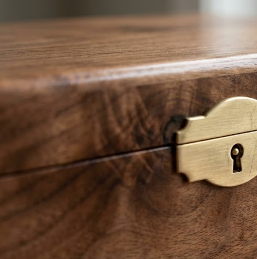 Close up texture of walnut finish wholesale wooden jewelry box with metal lock