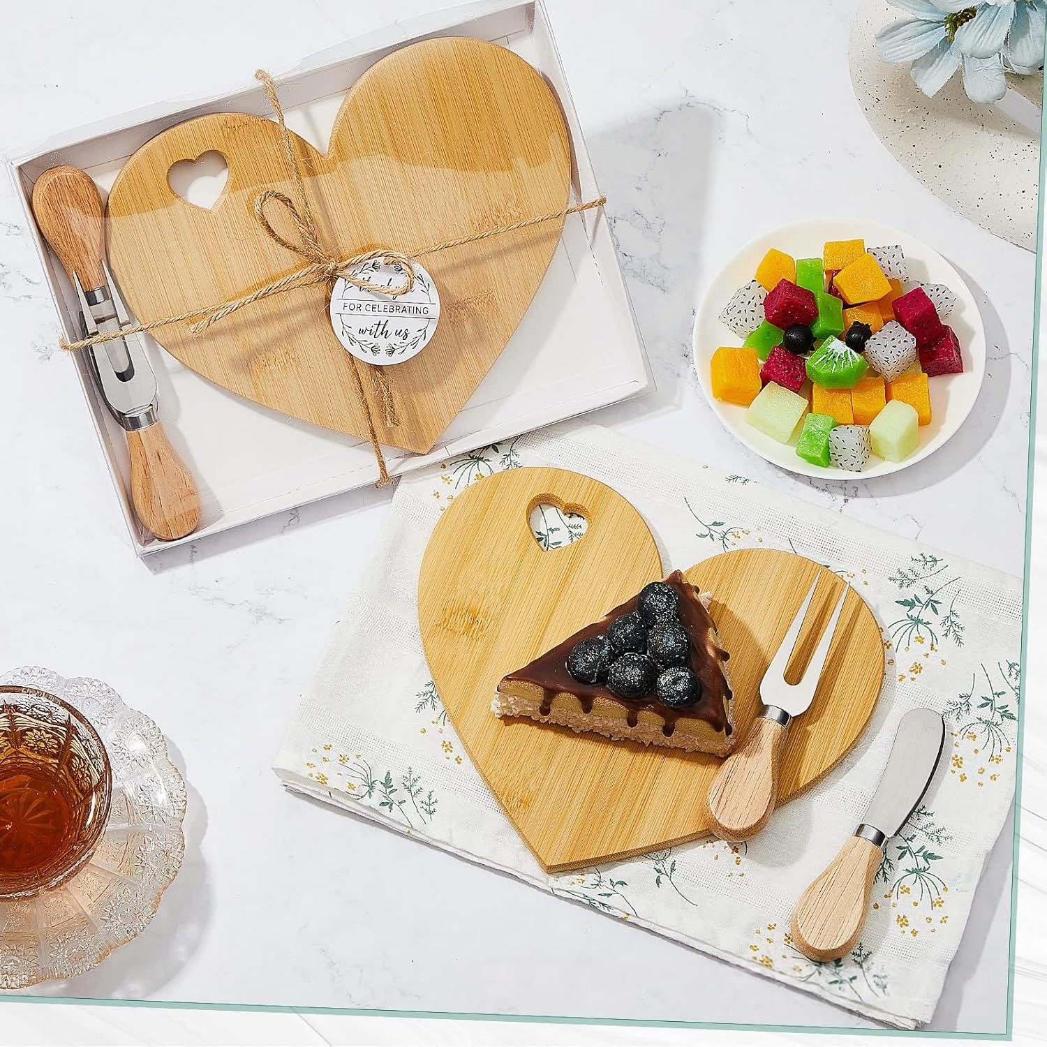 Mini Bamboo Charcuterie Board Gift Set with Cheese Knife – The Perfect Wedding Favor 1 Individual charcuterie board serving cheese and crackers at a party.