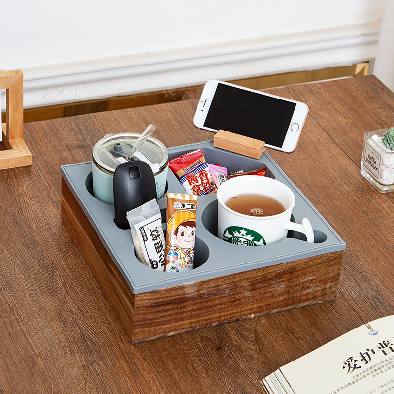 Wooden bedside organizer tray with phone holder and multiple storage compartments